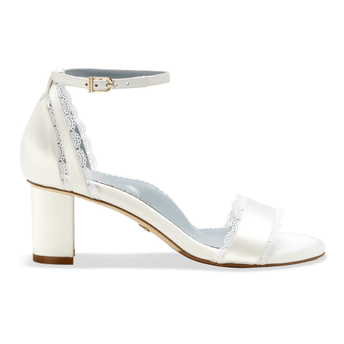 Stylish and comfortable, the Perfect Block Sandal 60 in Wedding White Satin features a 60mm block heel, arch support, and adjustable ankle straps.